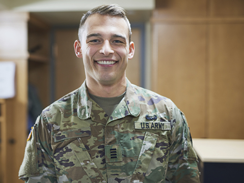 Soldier standing in the middle of a room